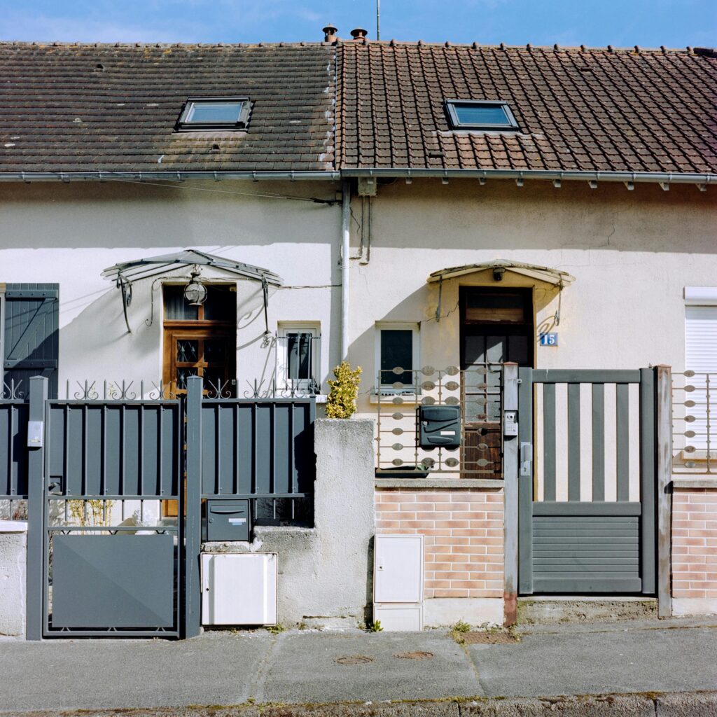 Picturesque row houses in a sunny neighborhood of Compiègne, France.